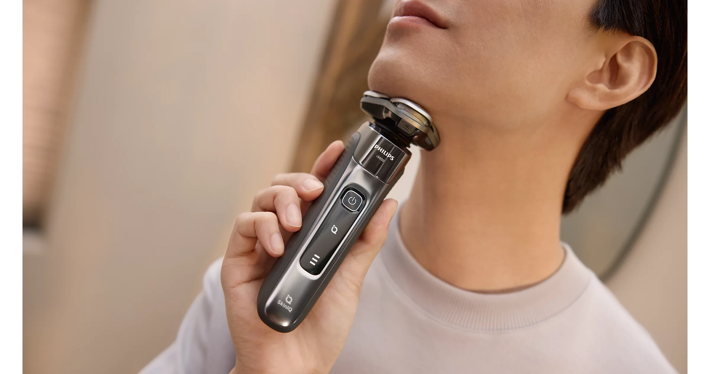Philips i9000 drėgno ir sauso skutimo elektrinis skustuvas su „SkinIQ“ | X9002/10 aprašymas - Prekės nuotrauka