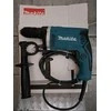 Makita HP1631 Smūginis gręžtuvas, 710 W , 13 mm, ranka užveržiamas griebtuvas, (Ekspozicinė prekė)