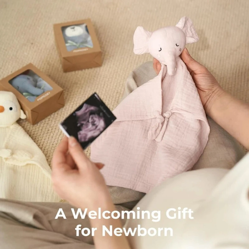 Momcozy medvilninis drambliuko komfortinis žaisliukas kūdikiams, rožinės spalvos