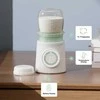 MOMCOZY ĮKRAUNAMAS KELIONINIS BUTELIUKŲ ŠILDYTUVAS