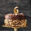 Auksinė žvakutė tortui skaičius "6"