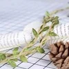 Dovanų juostelė su žaliais lapeliais, 3 m