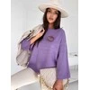 Moteriškas violetinis oversize megztinis Justi