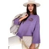 Moteriškas violetinis oversize megztinis Justi