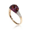 Auksinis žiedas su brangakmeniais. Metalas: Raudonas Auksas. Praba: 585°. Akmuo: Briliantai , Rubinas , Granatas - 18 - 2.33 g. - Briliantai (0,09Ct), Rubinas (0,495Ct), Granatas (0,846Ct)