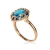 Auksinis žiedas su brangakmeniais. Metalas: Raudonas Auksas. Praba: 585°. Akmuo: Briliantai , Mėlynas topazas - 17 - 3.35 g. - Briliantai (0,112Ct), Mėlynas topazas