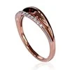 Auksinis žiedas su brangakmeniais. Metalas: Raudonas Auksas. Praba: 585°. Akmuo: Briliantai - 17 - 2.79 g. - Briliantai (0,05Ct)