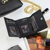 Moteriška odinė piniginė STEVENS, juoda, su RFID apsauga Z01-D02