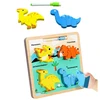 Lean Toys Medinė edukacinė dėlionė su dinozaurais ir piešimo lenta