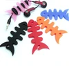 Hurtel Fish-shaped headphone cable wrap – žalias