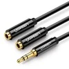 UGREEN AV123 AUX 3.5mm kištukas - 2x 3.5mm lizdai kabelis 0.25m juodas