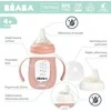 BEABA MOKOMASIS STIKLINIS BUTELIUKAS-GERTUVĖ 2IN1, 210 ML, OLD Rožinis, SILIKONINIAME DĖKLE