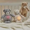 NATTOU Sleepy - dūzgiantis mielas žaislas su verksmo jutikliu 4in1 | Šuo Ecru