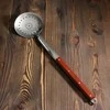 Kapgir Kiaurasamtis uzbekiškam kazanui 64 cm su medine rankena