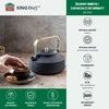 Juodas ketaus arbatinukas su auksine rankena