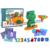 Lean Toys Matematinis Žaidimas Dinozauras su Svarstyklėmis