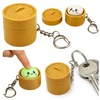 Lean Toys Raktų pakabukas su šviečiančiu koldūnu ir atverčiamu dangteliu, 3,5 × 3,5 cm