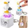 Lean Toys Raktų pakabukas su žuvėdros figūrėle, su šviesa ir garsu, baltas, pilkas ir geltonas, apie 8 × 2,5 × 2,5 cm