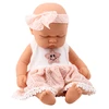 Lean Toys Lėlė kūdikis su rausva suknele ir lankeliu 24 cm