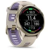 Išmanusis laikrodis Garmin Forerunner 970, Šviesios aukso spalvos titanas su žalsvai pilkos spalvos korpusu ir žalsvai pilku / permatomu indigo spalvos dirželiu