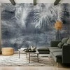 Artgeist Fototapetas - Abstraction with nature - exotic leaves on a mėlynas background with pattern
