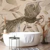 Artgeist Fototapetas - Bird among the leaves - floral motif with a flying peacock in cool tones
