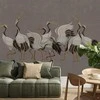 Artgeist Fototapetas - Crane dance – bright silhouettes of birds against a warm pilkas background with texture