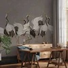 Artgeist Fototapetas - Crane dance – bright silhouettes of birds against a warm pilkas background with texture