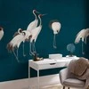 Artgeist Fototapetas - Evening by the pond - a group of cranes drawn in dry pastel on a dark turquoise background