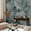 Artgeist Fototapetas - Exotic nature in the jungle - floral landscape with leaves with patterns