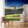 Artgeist Fototapetas - Football pitch - illuminated stadium with crowded stands
