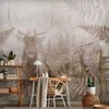 Artgeist Fototapetas - Forest motif - deer with antlers among fern leaves on concrete pattern