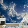 Artgeist Fototapetas - Starry Clouds and Delicate Light Over a Corner of the Sky