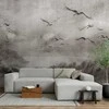 Artgeist Fototapetas - Swan flight - abstract landscape of birds over a lake with texture