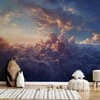 Artgeist Fototapetas - The Sun in Hiding: The Golden Face of the Sky Over a Cloudy Sea