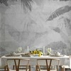 Artgeist Fototapetas - Vanishing jungle - landscape of exotic trees and leaves in pilkas tones