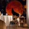 Artgeist Fototapetas - Wild nature - wolf on a background of a red moon in flames of fire