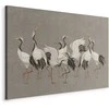 Artgeist Paveikslas - Crane dance – bright silhouettes of birds against a warm pilkas background with texture