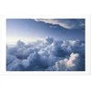 Artgeist Plakatas - Aerial Landscapes: Sunbeams Illuminating Puffy Cloud Formations