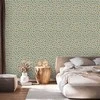 Artgeist Tapetas - Giraffe Pattern - animal pattern in turquoise spots on a light background.