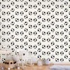 Artgeist Tapetas - Soccer - Symmetrical juodas-and-baltas soccer balls on a beige background.