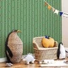 Artgeist Tapetas - Sports Whistles - Repeating pattern on a striped žalias background.