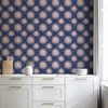 Artgeist Tapetas - Sunny Patterns - Repeating sun motif on a navy background.