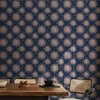 Artgeist Tapetas - Sunny Patterns - Repeating sun motif on a navy background.