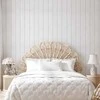 Artgeist Tapetas - Vertical Lines - Baltas background with a delicate wood pattern vertically.