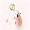 Kiko Milano „Hug Couture“ apimties suteikiantis, blizgus riboto leidimo „Lip Volume Shimmery“ lūpų blizgis, atspalvis 03