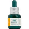 „The Body Shop“ skaistinamasis paakių serumas su vitaminu C (paakių švytėjimo serumas), 10 ml
