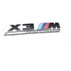 BMW X3 M F97 Konkurencija Galinė bagažinės emblema su užrašu 51148077609 Originali