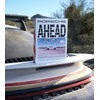 Knyga "PORSCHE AHEAD" prie kavos staliuko