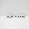 LAND ROVER DEFENDER Kapotas ROVER Emblema DAB500300 Naujas Originalus